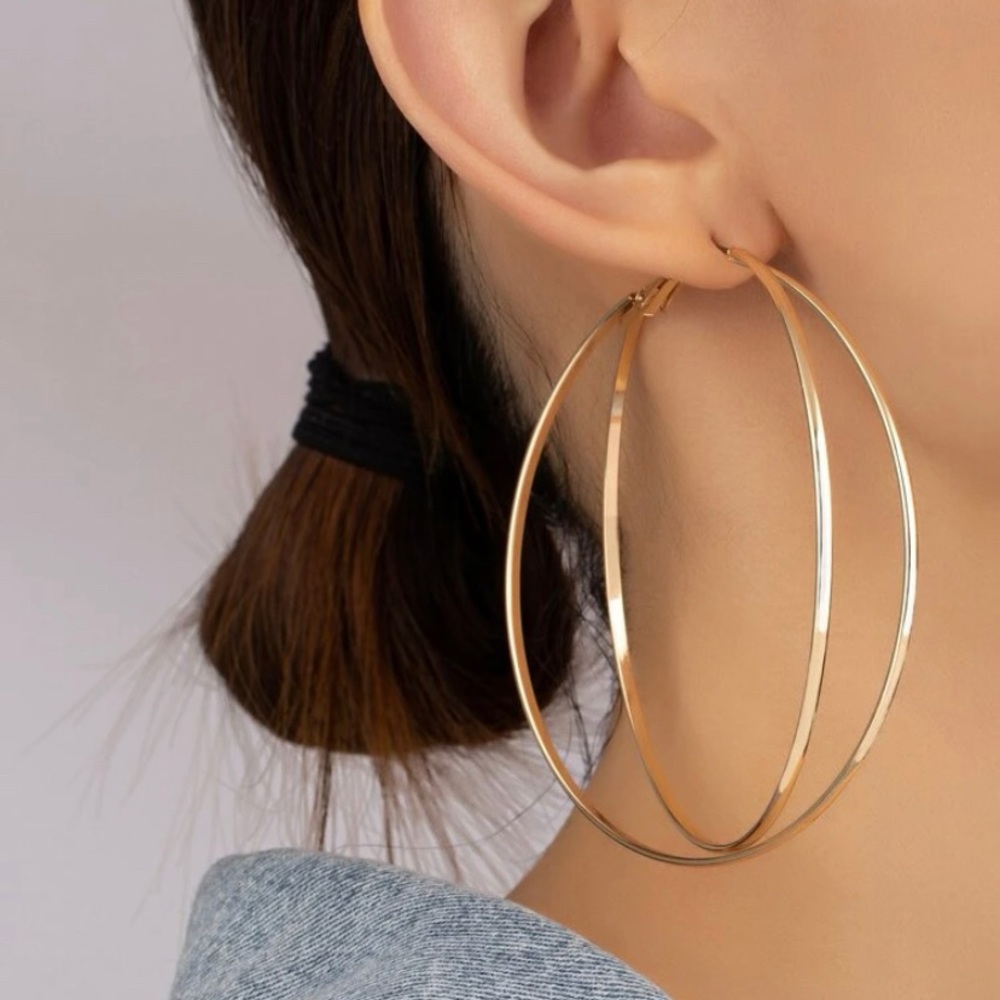 COPY - Large gold hoops.
